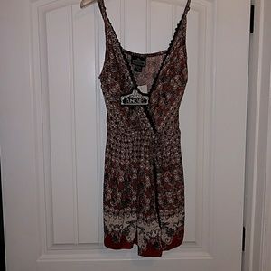 Brand new with tags.  Romper